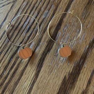 Pumpkin hoop earrings.